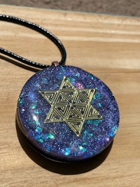 a necklace with a star of david on it