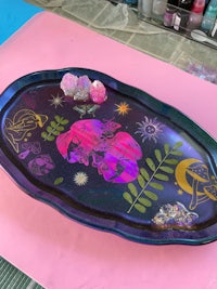 a tray with a blue and purple design on it