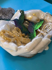 two hummingbirds in a bowl on a table